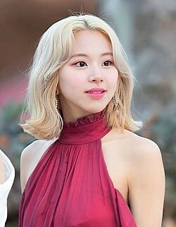 Editorial gallery of Chaeyoung (TWICE) styled in light spring looks full of sherbet pinks, mint greens, and warm ivory, highlighting sherbet peach, sea glass, buttermilk, mint foam, and rose coral.