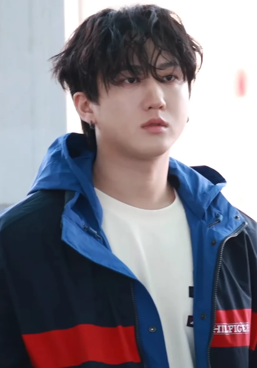 Changbin (Stray Kids) wearing cool jewel-toned gowns with sharp contrast, showcasing glacier blue, raspberry, graphite, arctic white, and ultra black from the Cool Winter palette.