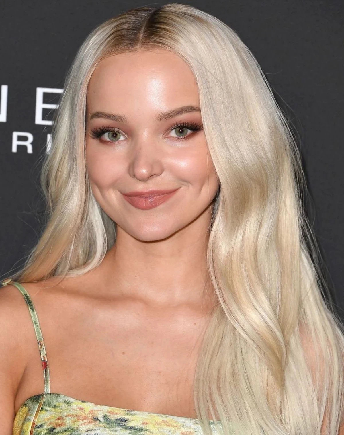 Dove Cameron wearing icy pastel tailoring with soft shimmer, showcasing bluebell, lavender mist, storm gray, cool teal, and soft navy from the Cool Summer palette.