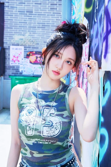 Editorial gallery of Gaeul (IVE) styled in cool winter outfits featuring sapphire, amethyst, and inky neutrals, highlighting glacier blue, raspberry, graphite, arctic white, and ultra black.