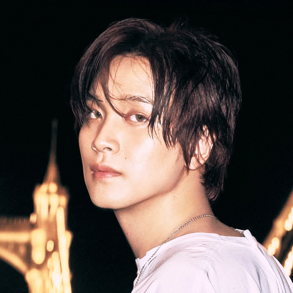 Editorial gallery of Haechan (NCT) styled in vibrant autumn outfits featuring saffron, teal, and gold hardware, highlighting burnt sienna, chartreuse, emerald, molten gold, and espresso.