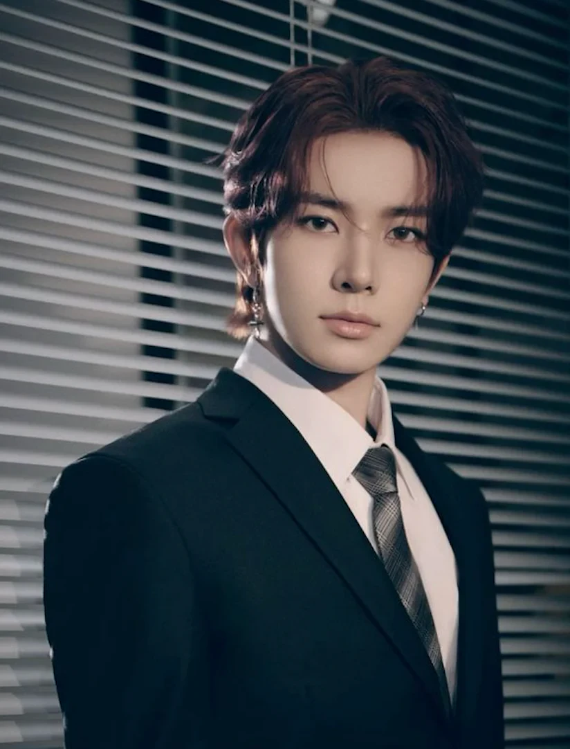 Editorial gallery of Heeseung (ENHYPEN) styled in neutral winter outfits highlighting sapphire, burgundy, and smoked grays, highlighting steel blue, cranberry, optic white, graphite, and imperial purple.