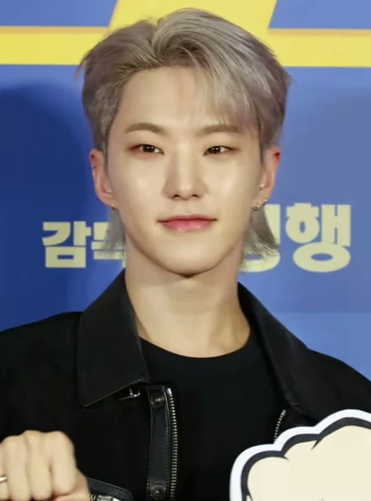 Hoshi (SEVENTEEN) wearing balanced jewel-toned looks with cool neutrals, showcasing steel blue, cranberry, optic white, graphite, and imperial purple from the Neutral Winter palette.