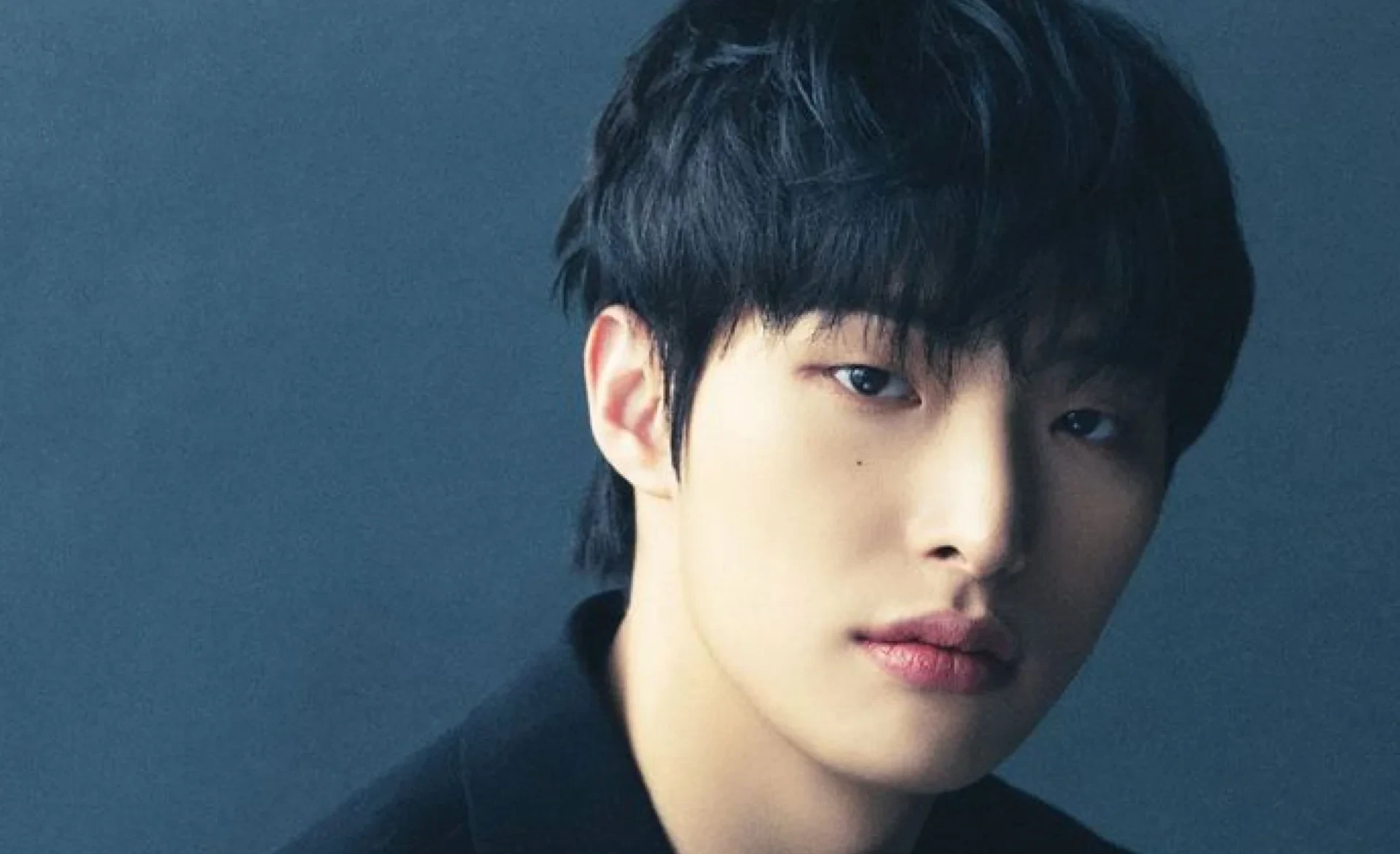 Editorial gallery of Mingi (ATEEZ) styled in neutral winter outfits highlighting sapphire, burgundy, and smoked grays, highlighting steel blue, cranberry, optic white, graphite, and imperial purple.