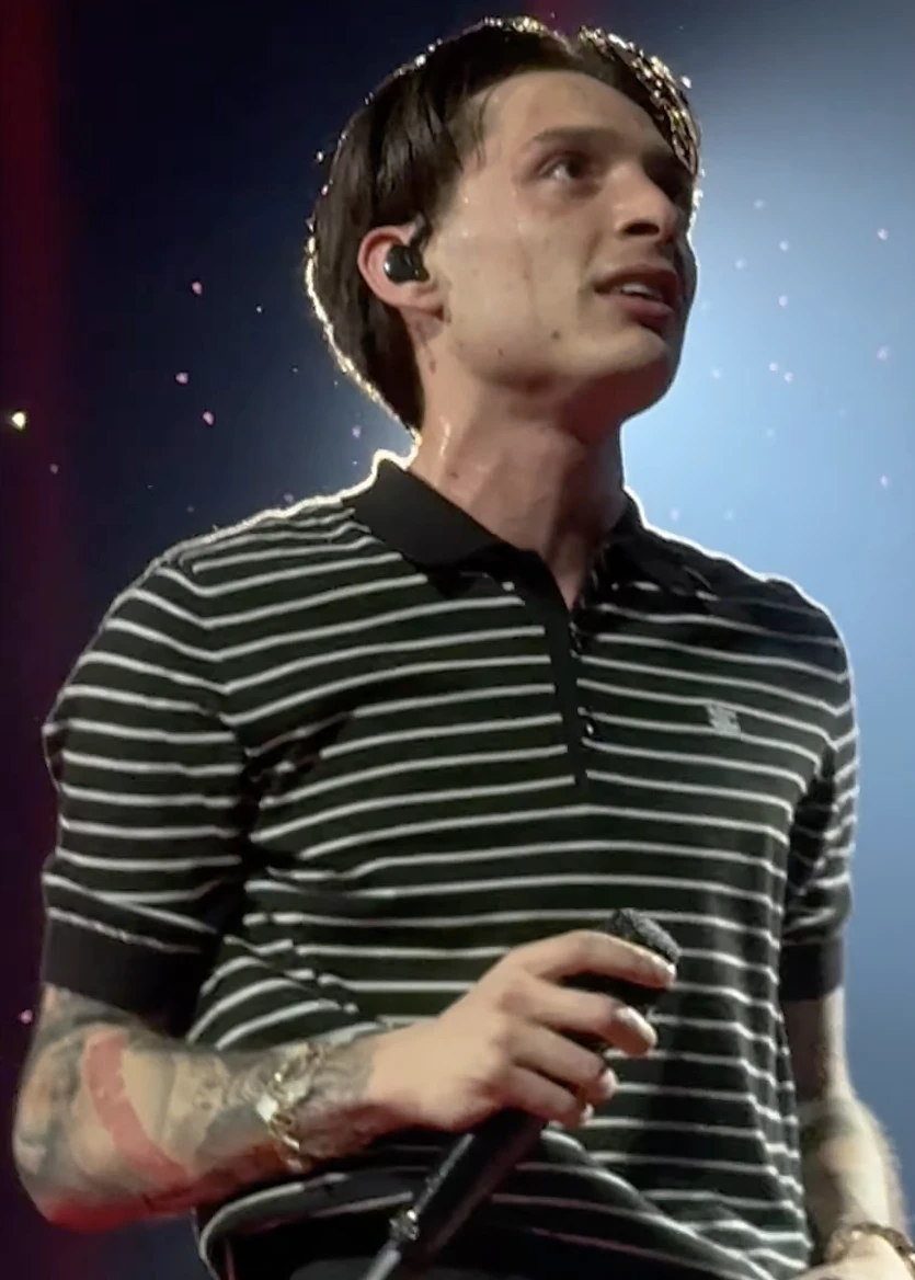 Editorial gallery of Peso Pluma styled in soft summer outfits blending dusty mauve, mist blue, and slate neutrals, highlighting heather gray, dusty mauve, mist blue, slate green, and antique silver.