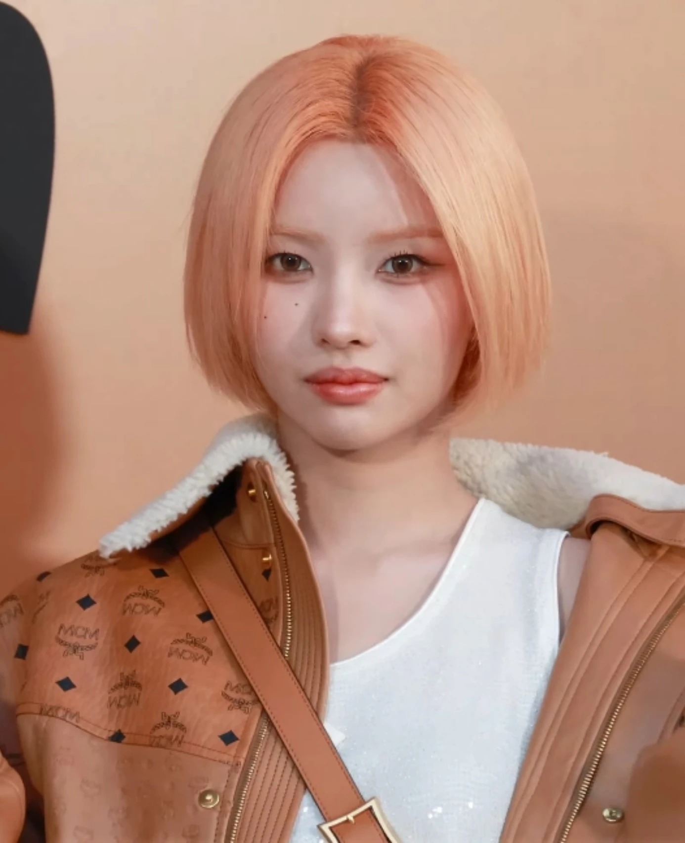 Soyeon ((G)I-DLE) wearing high-voltage winter ensembles with electric hues and chrome accents, showcasing fuchsia, royal blue, silver chrome, acid lime, and deep plum from the Vibrant Winter palette.
