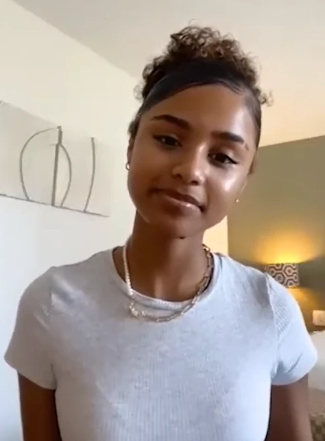 Tyla wearing icy pastel tailoring with soft shimmer, showcasing bluebell, lavender mist, storm gray, cool teal, and soft navy from the Cool Summer palette.