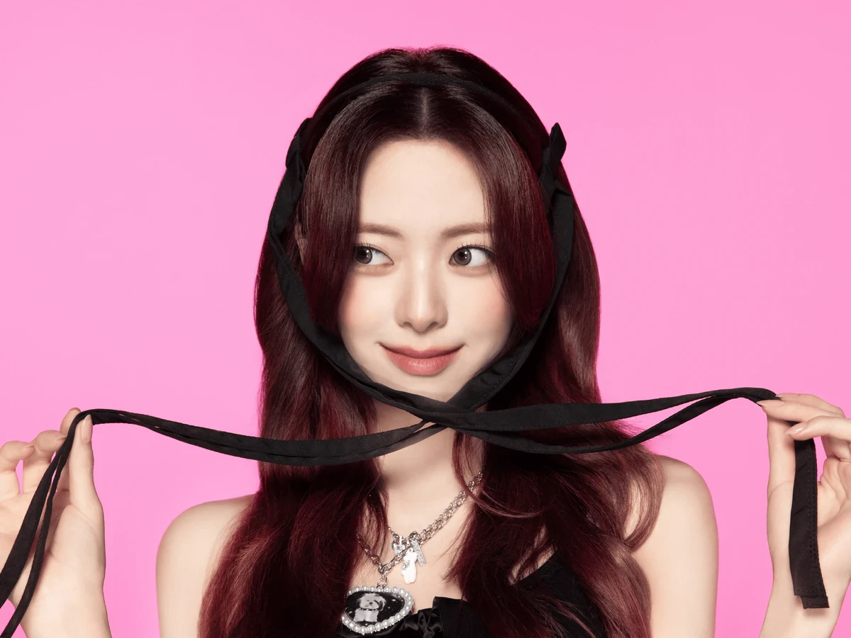 Editorial gallery of Yuna (ITZY) styled in cool winter outfits featuring sapphire, amethyst, and inky neutrals, highlighting glacier blue, raspberry, graphite, arctic white, and ultra black.